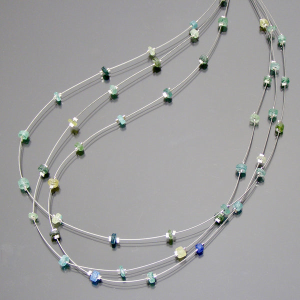 pastel colored  tiny beads on 3 strand necklace