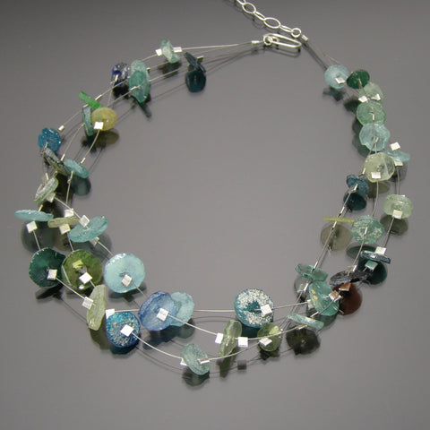 multi colored pastel roman glass discs  on 3 str necklace