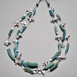 teal colored roman glass necklace
