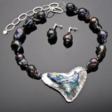 blue roman glass necklace with indigo pearls